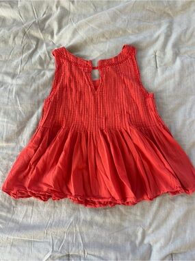 Anthropologie Orange Sleeveless Smocked Peplum Top